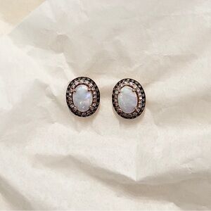 Effy opal earrings with diamond halo set in 14k rose gold.